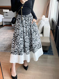 2025 Retro cotton printed skirt women's spring and autumn pear-shaped figure is thin, elastic waist temperament umbrella skirt