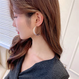2025 S925 silver needle   style earrings Internet celebrity temperament light luxury earrings exaggerated atmosphere C-shaped large circle earrings