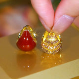 Angola red double-sided basket ear buckle simple light luxury fashion simple versatile red hollow water drop earrings