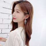 2025 2023 autumn  personalized fringed earrings long inlaid with colored zircon stud earrings new fashionable water drop earrings women