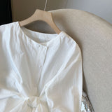 2025 round neck long-sleeved shirt women's early spring design sense chic unique lace-up shirt Korean atmosphere top
