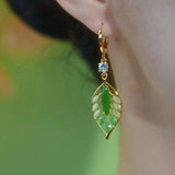 luxury green golden branches and jade leaf ear buckles light luxury white green diamond leaf earrings simple fringed earrings