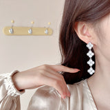 2025 High-end light luxury temperament lucky grass earrings s925 silver needle long tassel zircon fashion commuter flower stud earrings