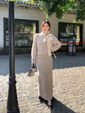 2025 popular autumn and winter new temperament bow knitted top + A-shaped half-length skirt two-piece set 25201