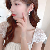 2025 gentle temperament sweet zircon flower pearl earrings fashion versatile high sense niche light luxury stud earrings women