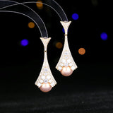 2025 Elegant temperament  exaggerated atmosphere heavy industry earrings wholesale copper inlaid zircon design feeling water drop pearl earrings women