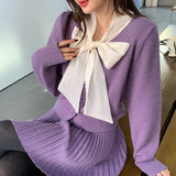 2025 popular autumn and winter loose long-sleeved temperament silver silk long-sleeved bow solid color knitted sweater sweater 25200