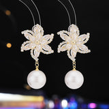 2025 high-end flower earrings super flash zircon windmill pearl earrings silver needle versatile creative bride earrings women