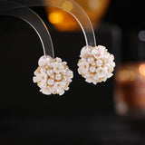 2025 S925 silver needle front and rear one two-wear flower cluster earrings niche design three-dimensional small ball pearl shell flower stud earrings