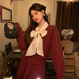 2025 popular autumn and winter loose long-sleeved temperament silver silk long-sleeved bow solid color knitted sweater sweater 25200