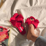 Wearing flat slippers women's shoes 2019 Korean version of the summer new large bow satin round head sandals Wild half slippers