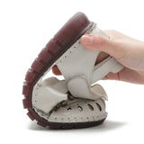 kamames Summer New Head Layer Cowhide Flat Bottom Women's Shoes National Wind Leather Hollow Out Small Flower Women's Sandals Mother Shoes